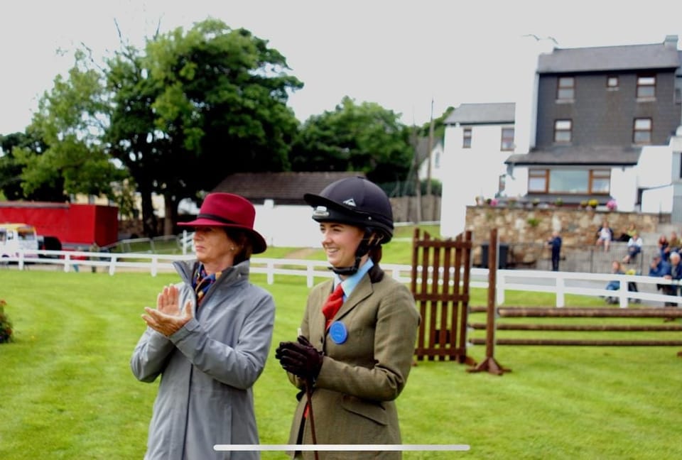 The Purple Hat Approach: Lorli Higgins on Riding, Reinvention and Refusing to Sit Still